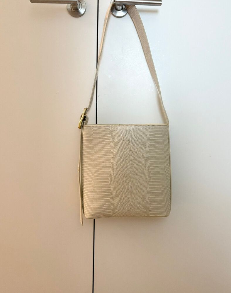 Brie Leon cream bucket bag