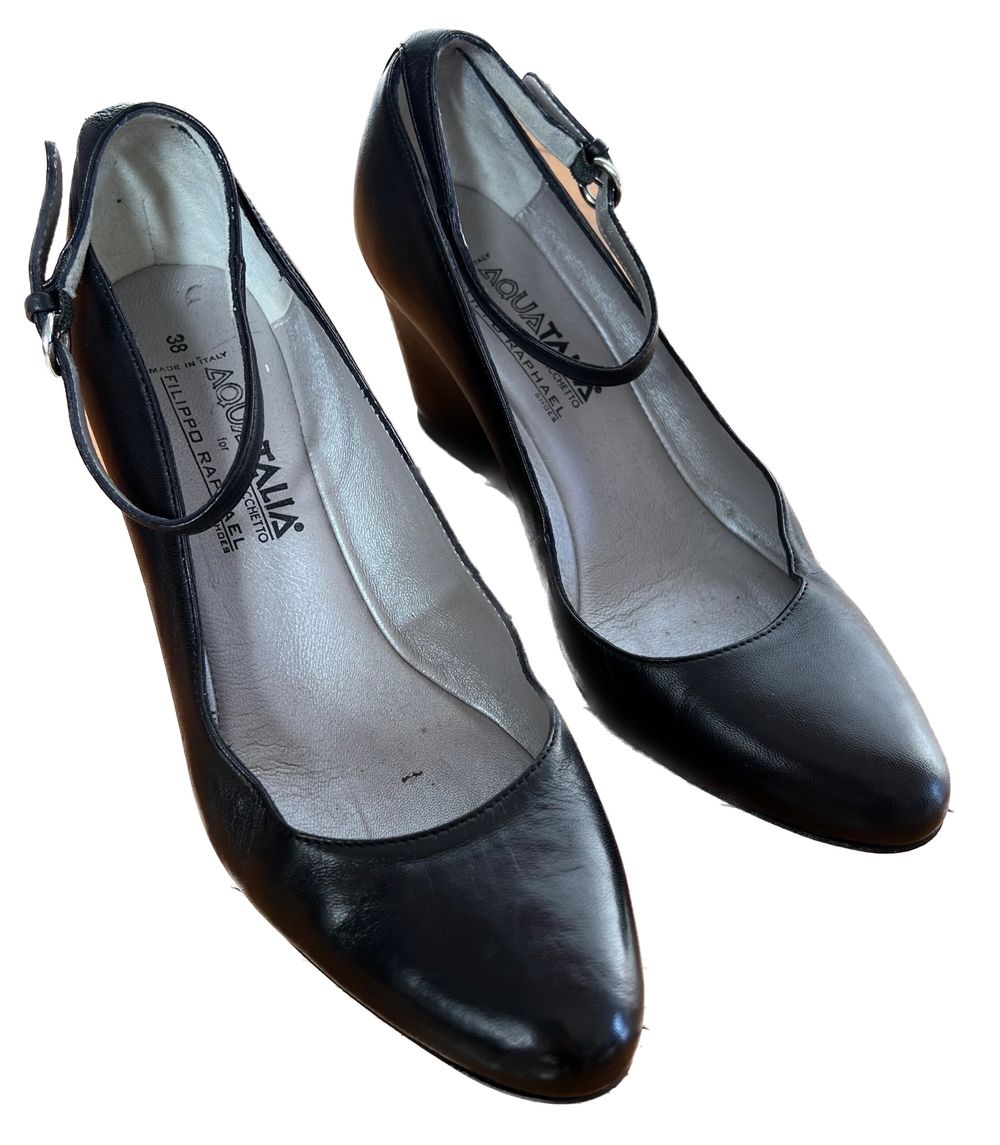 Black leather wedge shoes