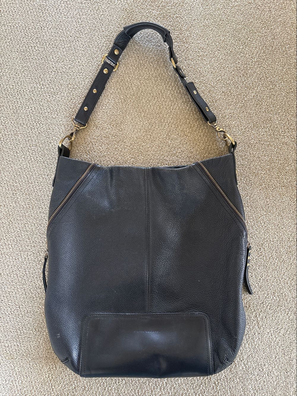 Status Anxiety leather bag