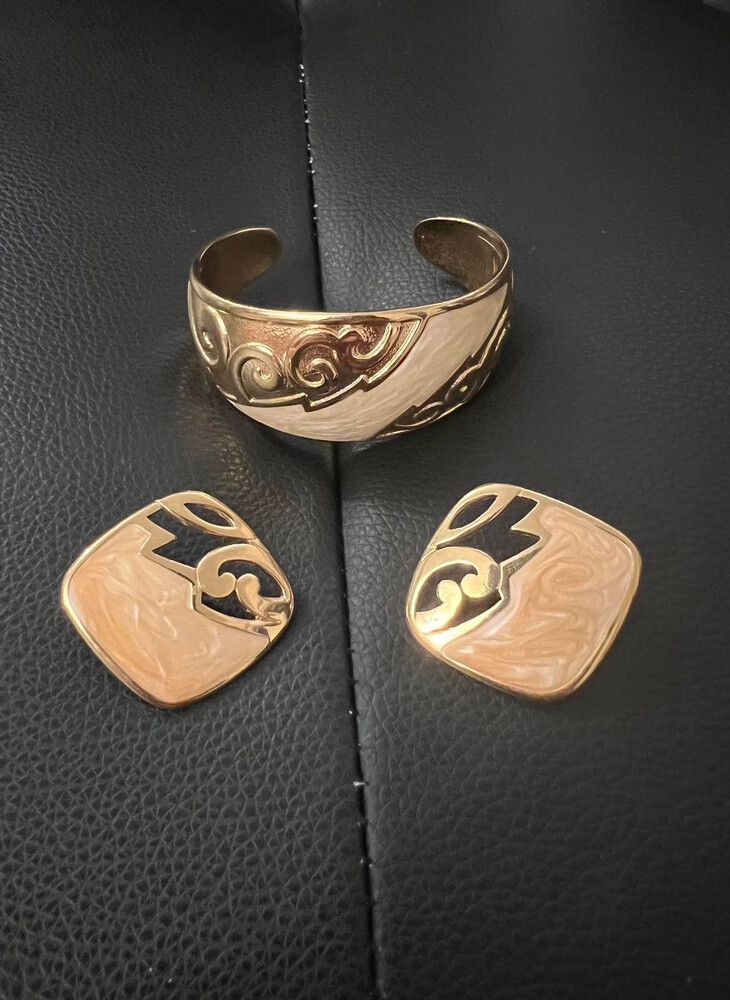 Avon gold tone cuff bracelet and clip on earrings set