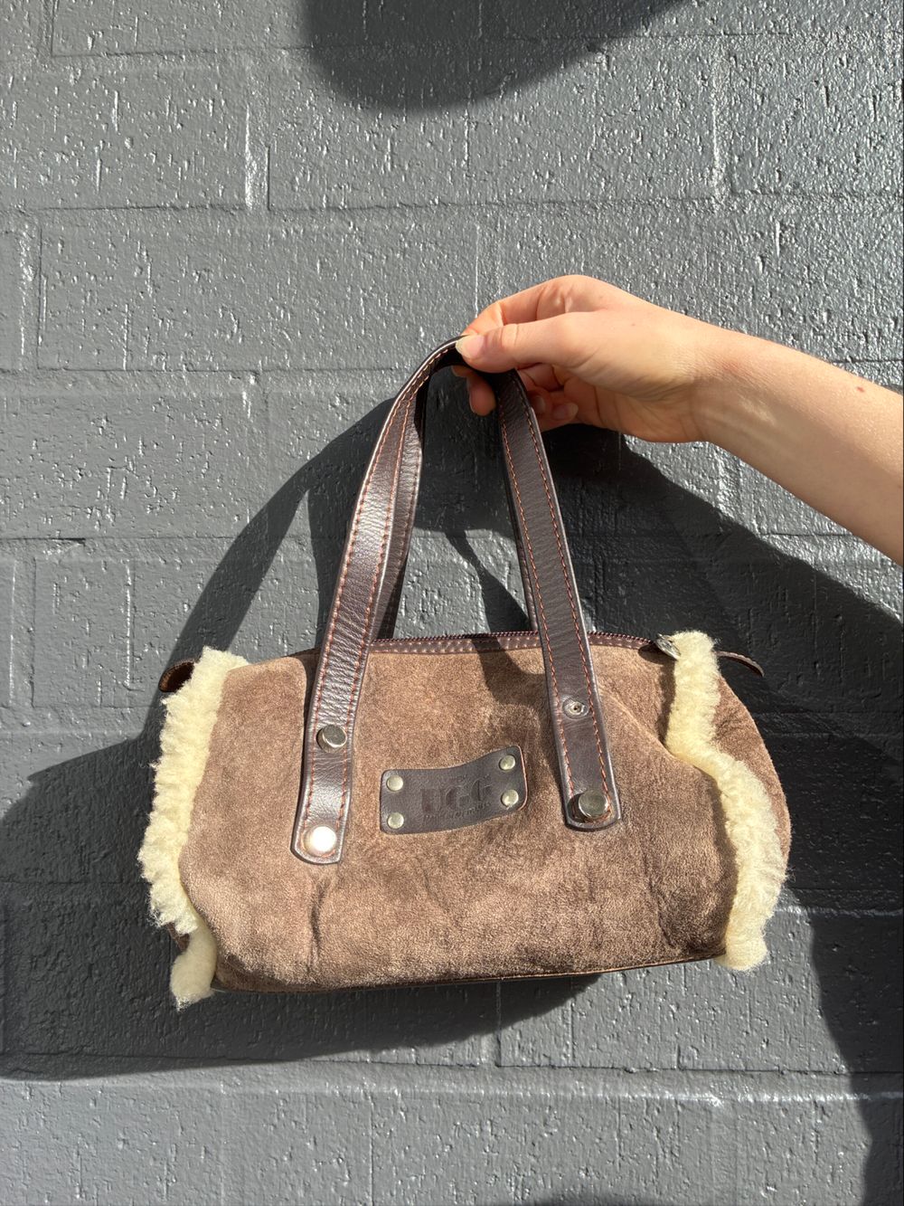 UGG small barrel sheepskin bag