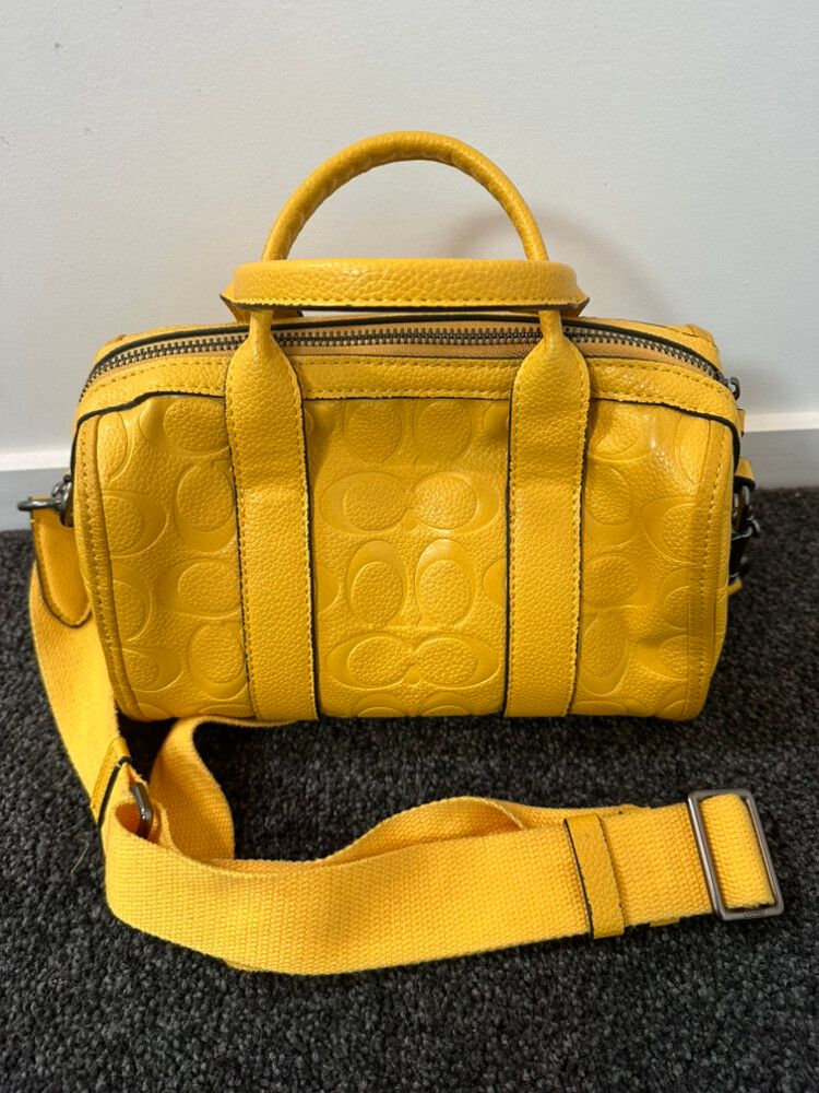 Coach Yellow Embossed Handbag