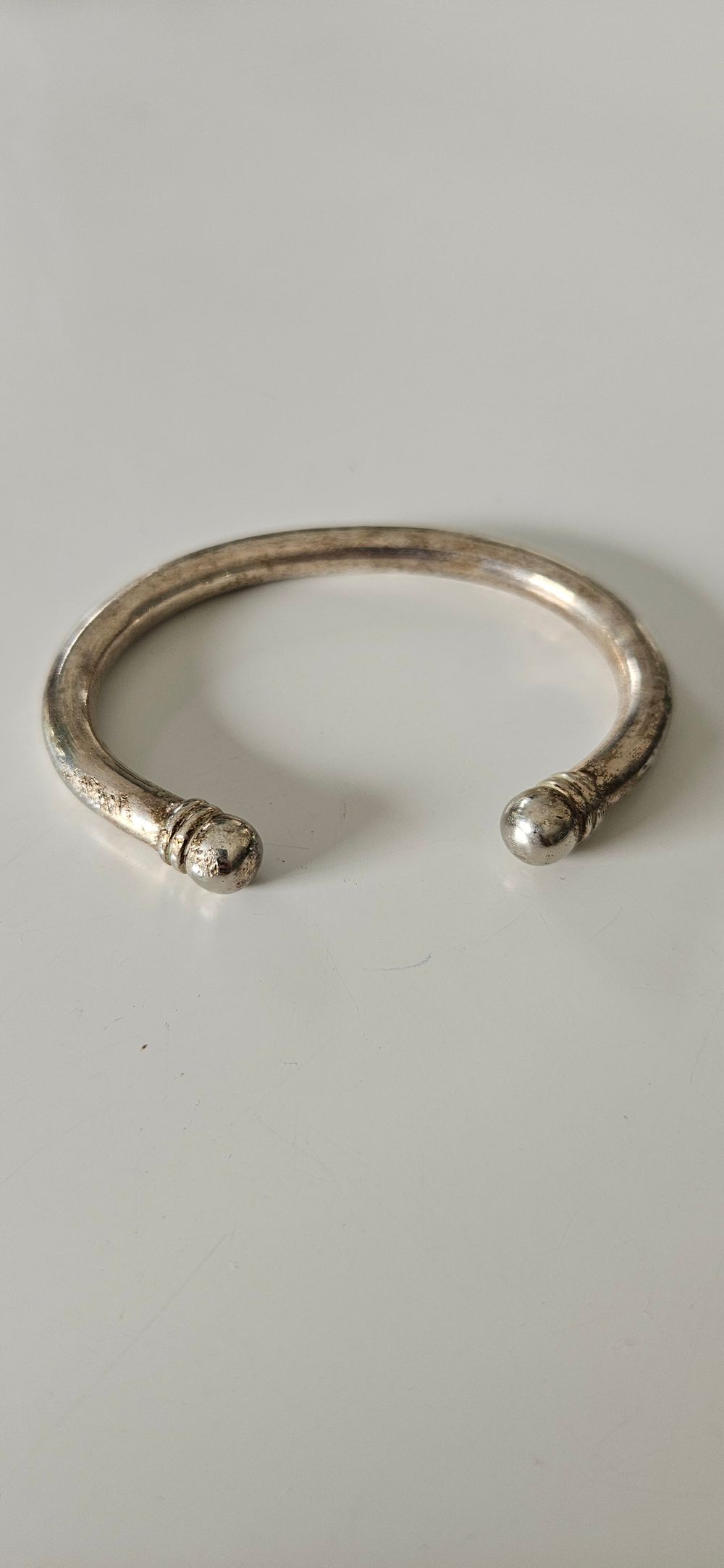 Silver colored bracelet