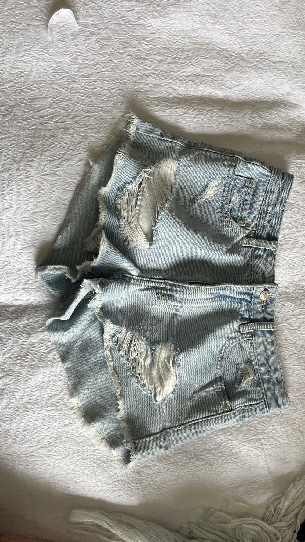 Light Wash Distressed Denim Shorts