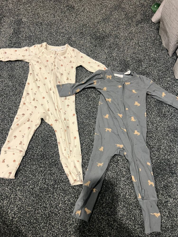2 One piece Zip Suits 3-6months