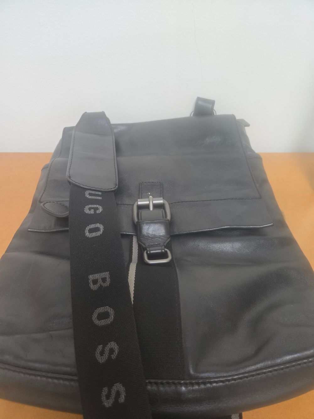 Hugo Boss black leather sling bag