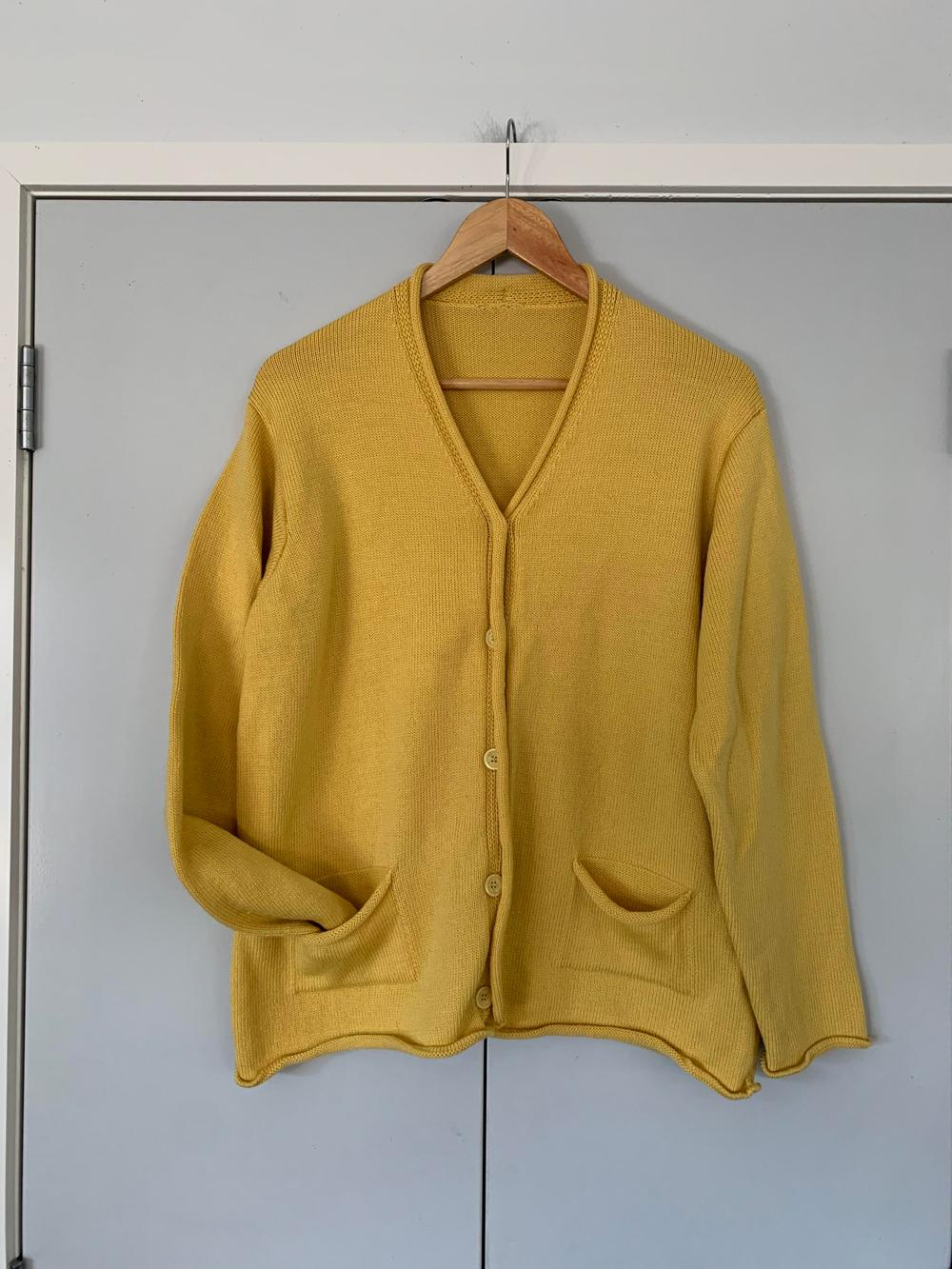 Hand knitted merino wool cardigan relaxed fit button up pockets yellow