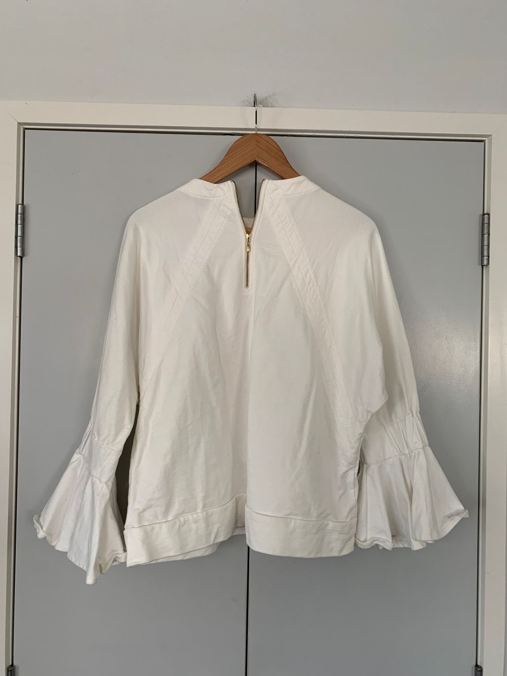 Karen Walker oversized ruffle sleeves white cotton top sweater loose casual chic capsule statement S image 5