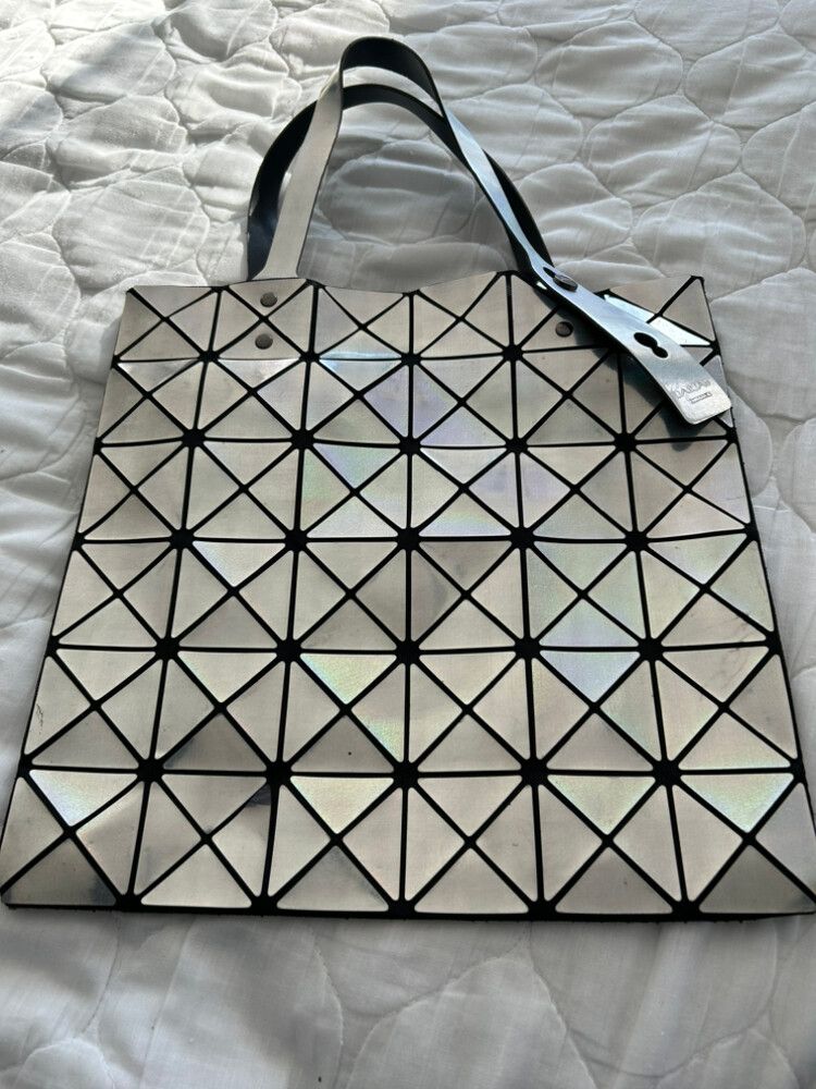 silver and black geometric tote bag