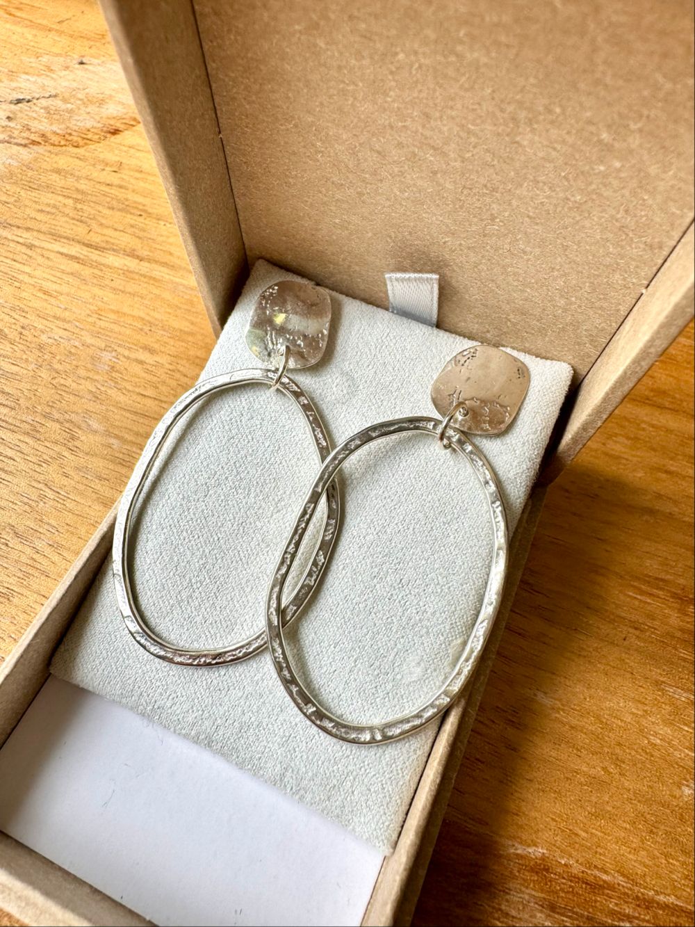 Love Winter Sterling Silver Oval Hoop Earrings