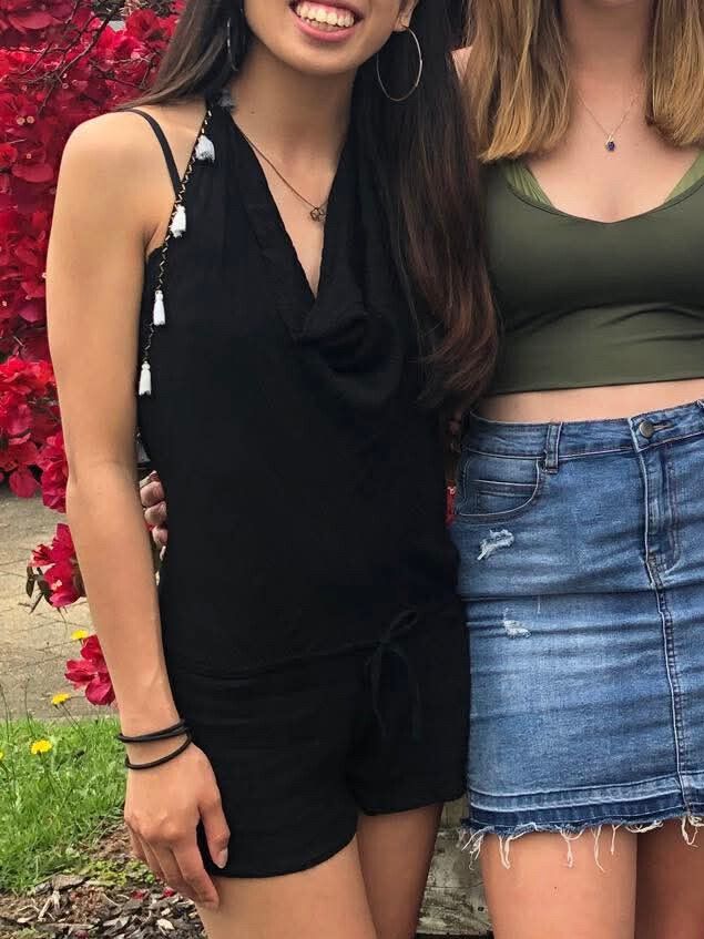 Black mini playsuit with tassel halter ties