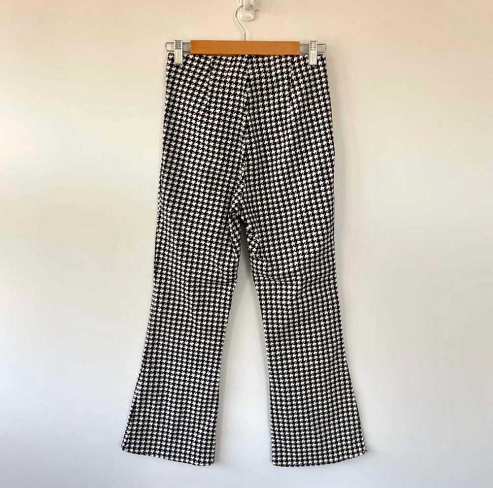 Black and white houndstooth flared pants