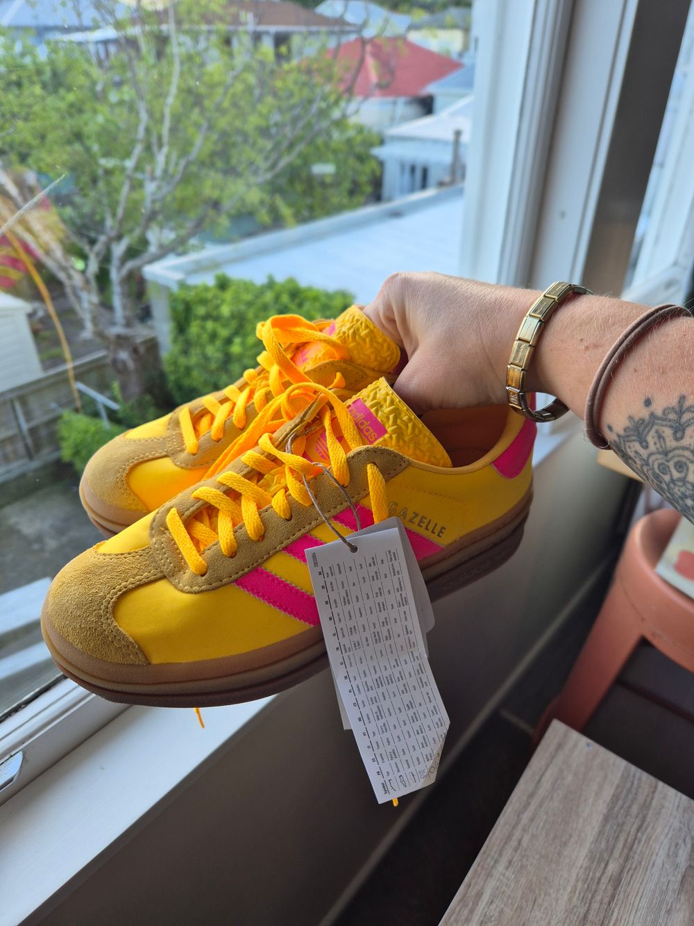 yellow addidas trainers