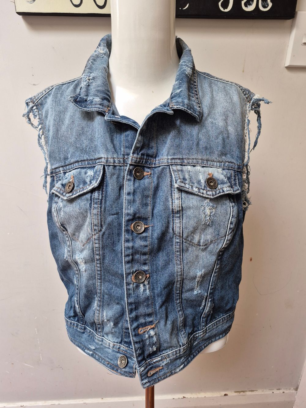 Denim sleeveless jacket