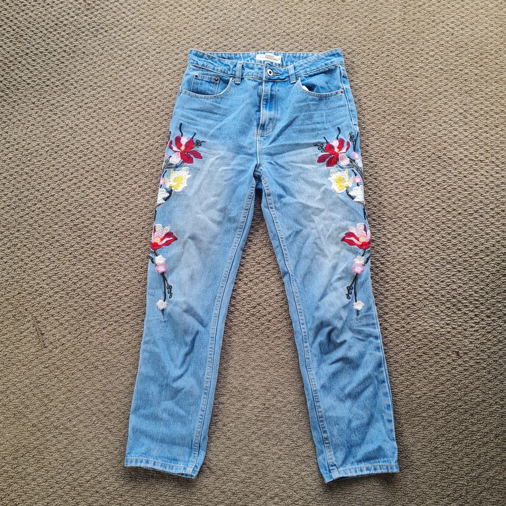 Lost in lunar floral jeans - size 8
