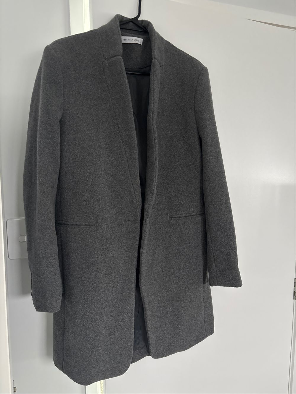 Assembly label coat
