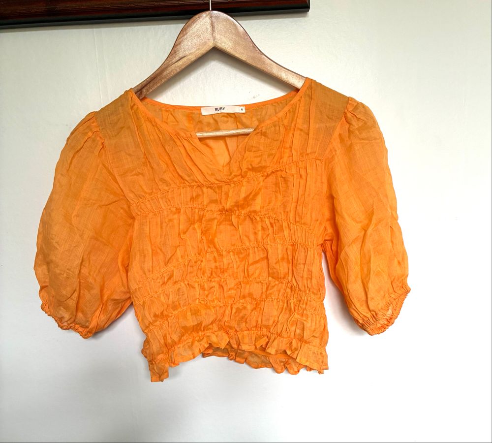 RUBY Orange Smocked Puff Sleeve Top