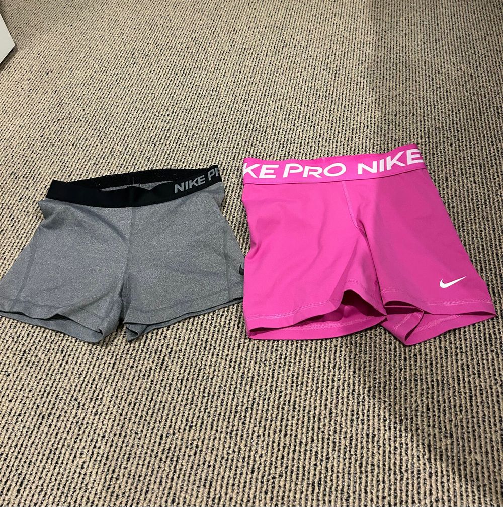 nike pro shorts grey and pink