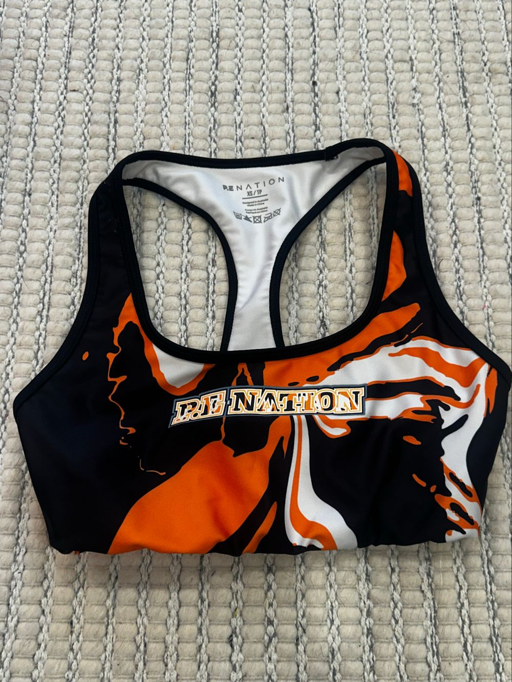 PE Nation Black Orange White Sports Bra
