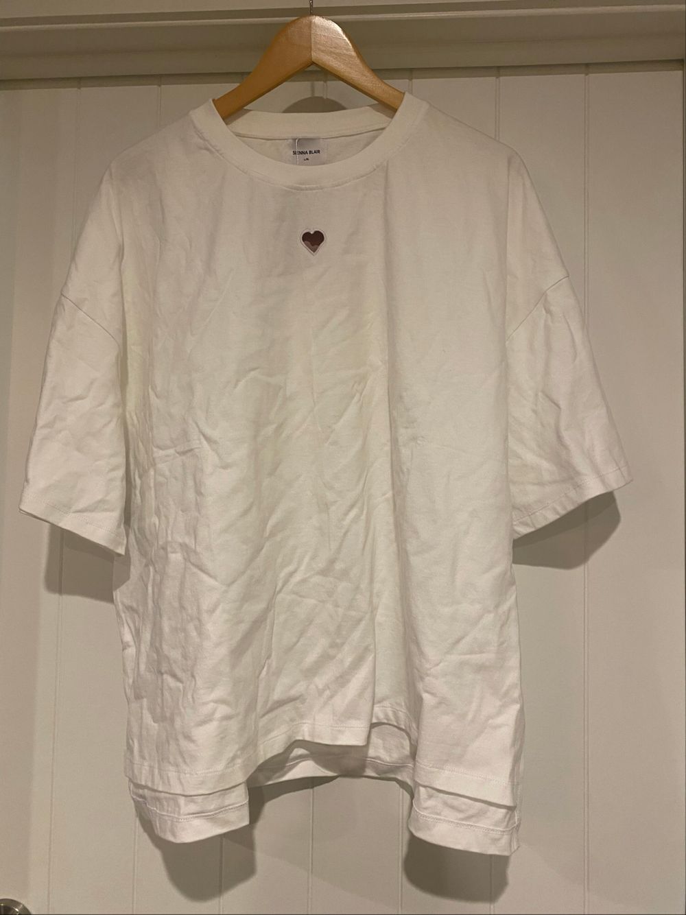 Sienna Blair white T-Shirt with heart cut out