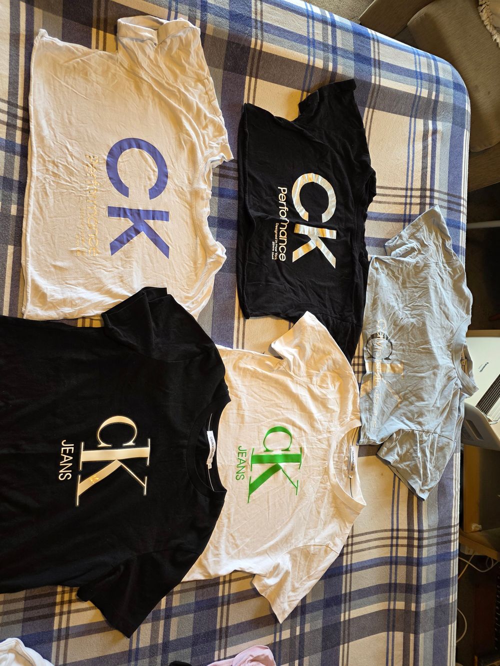 3 x Calvin Klein cropped workout tops