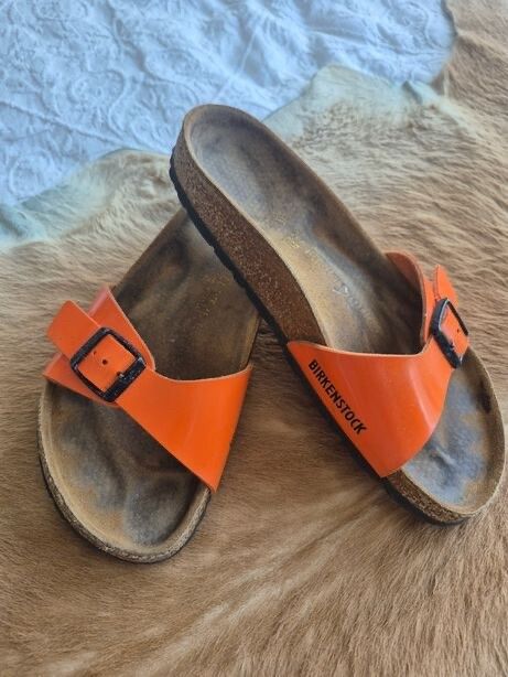 Birkenstock Madrid Tangerine Patent Leather sandals.