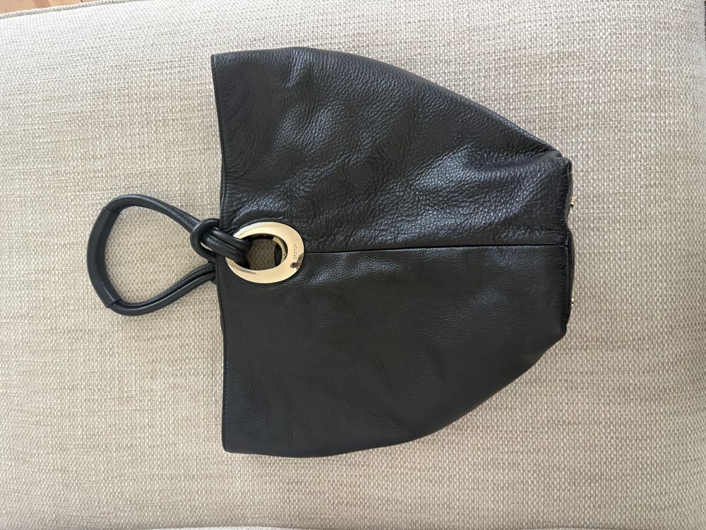 Black Pebbled Leather Handbag With Gold Ring Hardware
