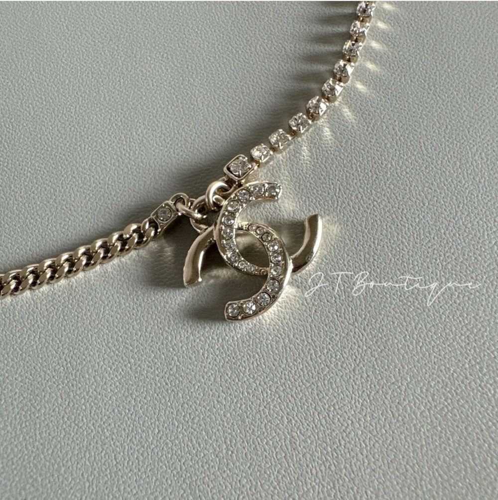 Authentic CHANEL CC Logo Crystal and Chain Necklace in Gold