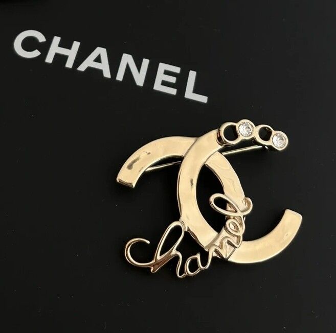 Authentic Gold-Tone Brooch with Crystal Accents