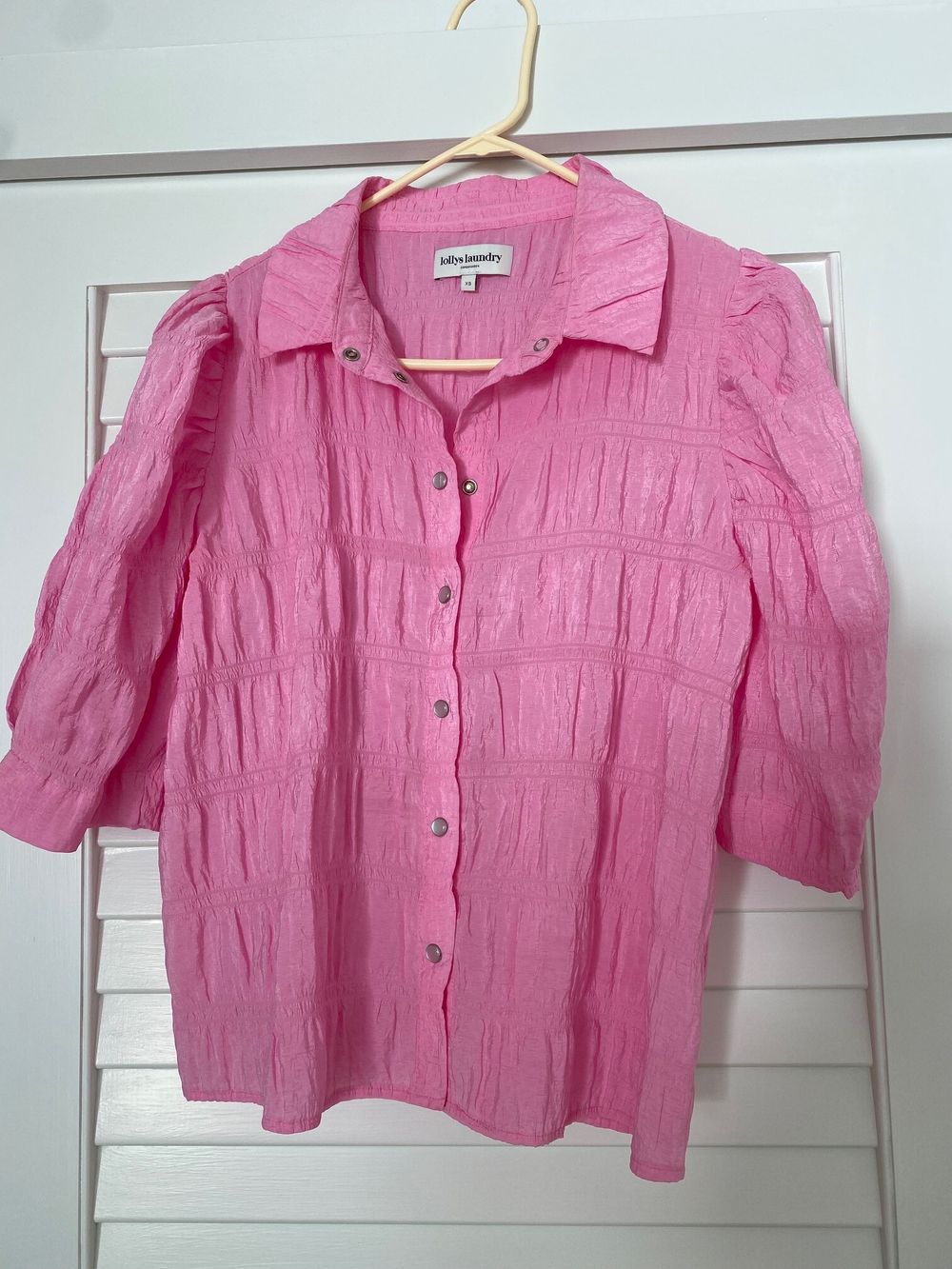 Pretty, bright pink blouse.