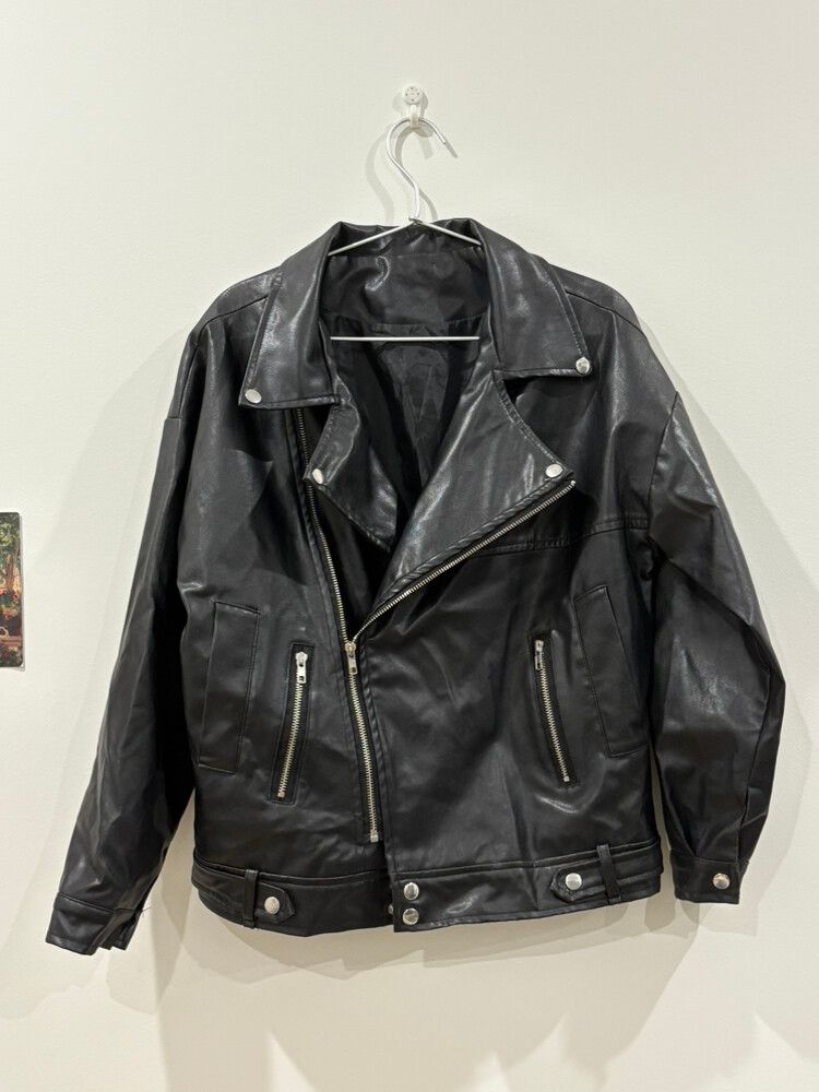 Black leather jacket with zip front.