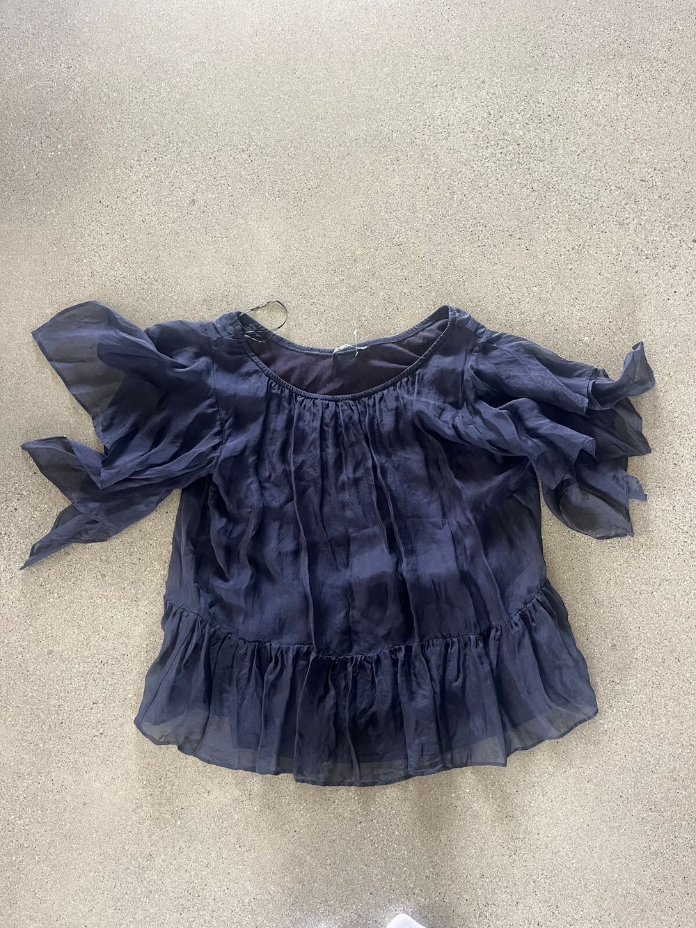 navy frilly blouse