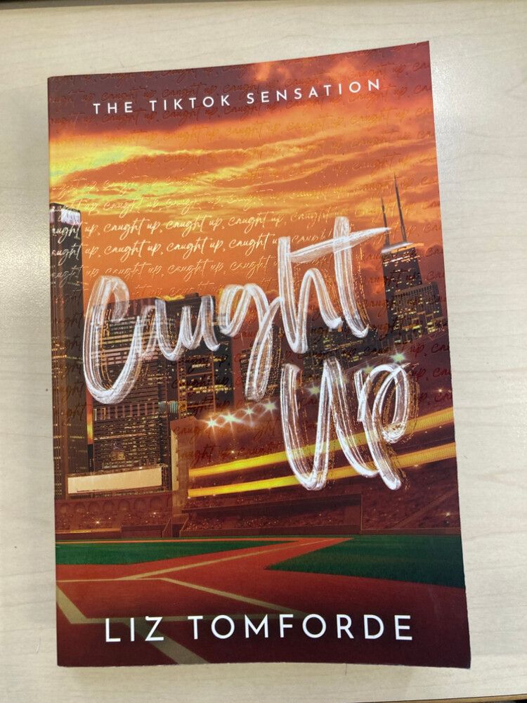 Caught up by Liz Tomford