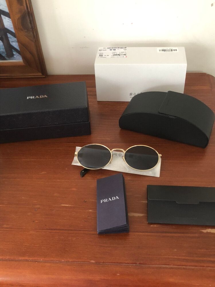 Prada oval sunglasses (Worn once, Immaculate condition)