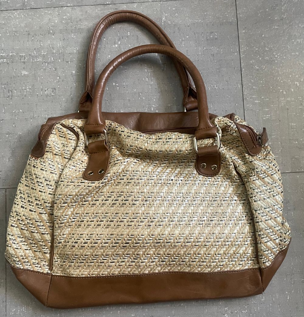 Brown Woven Straw And Leather handbag