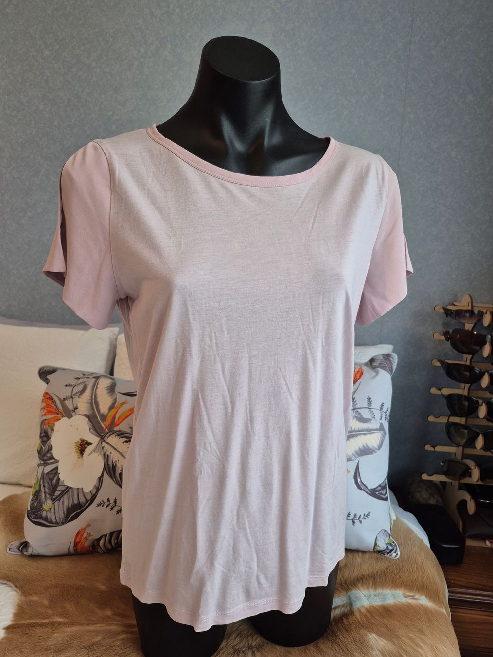 Pink Top with cutout on back.