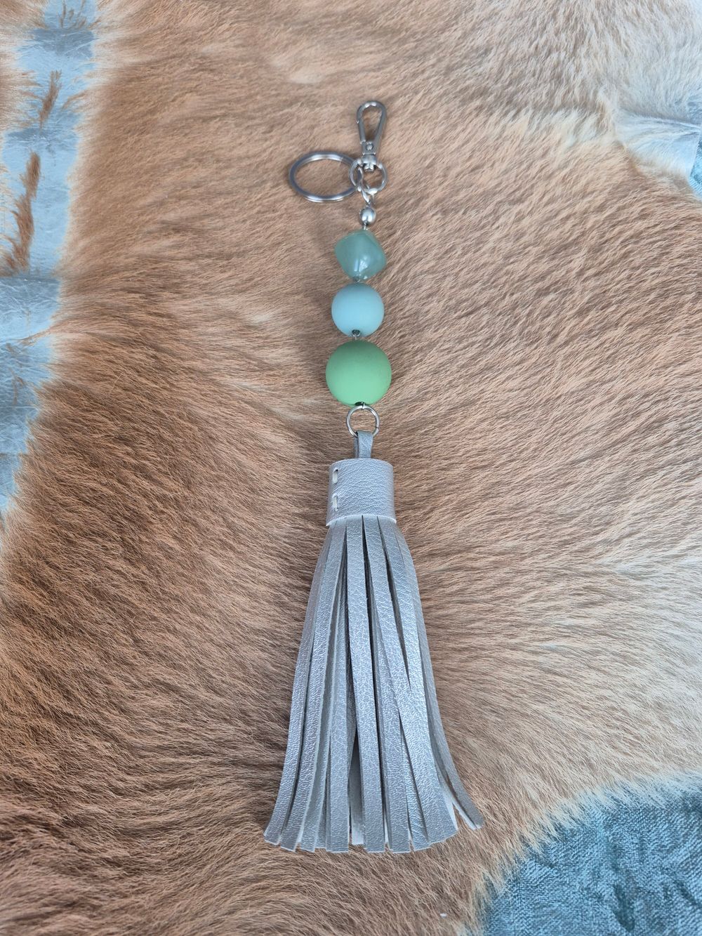 Faux Leather Tasseled Beaded Keychain.