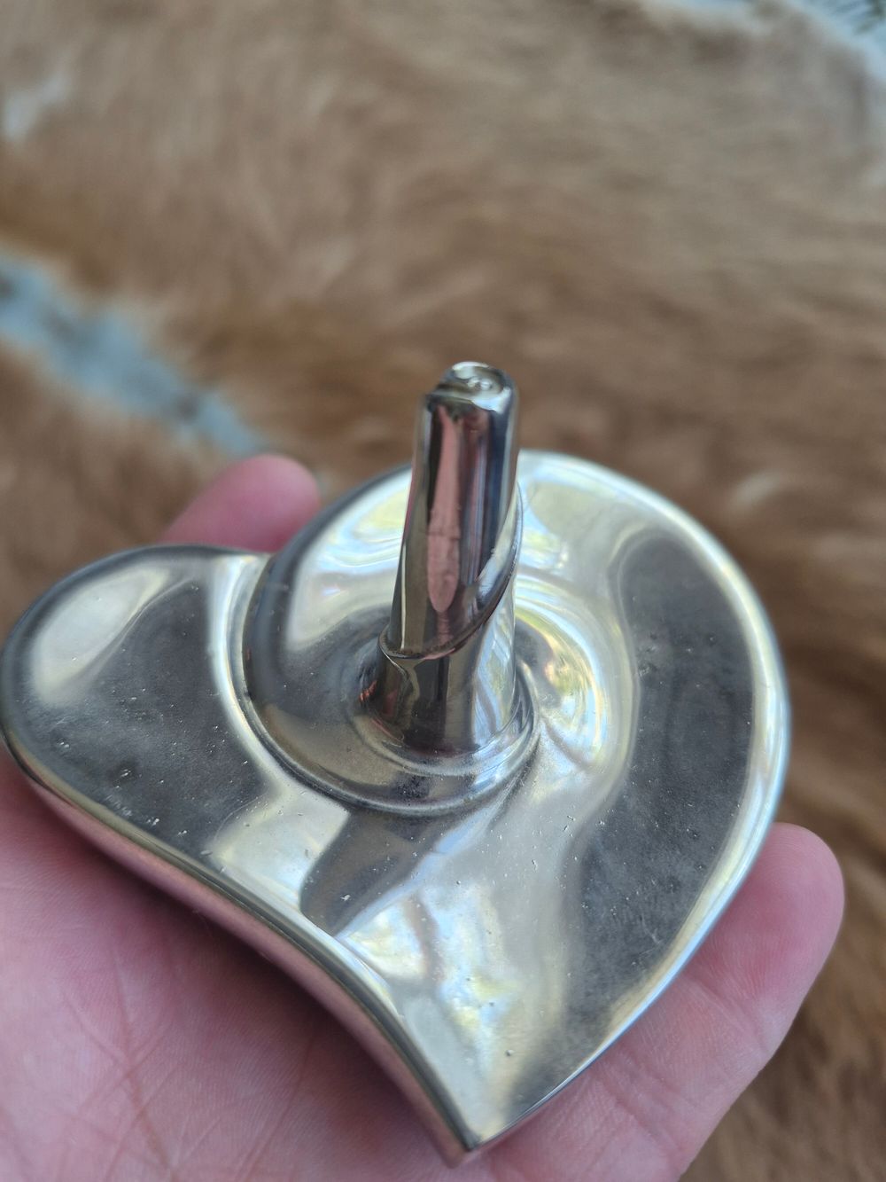 Godinger Silver Art Co. silver-plated heart-shaped ring holder.