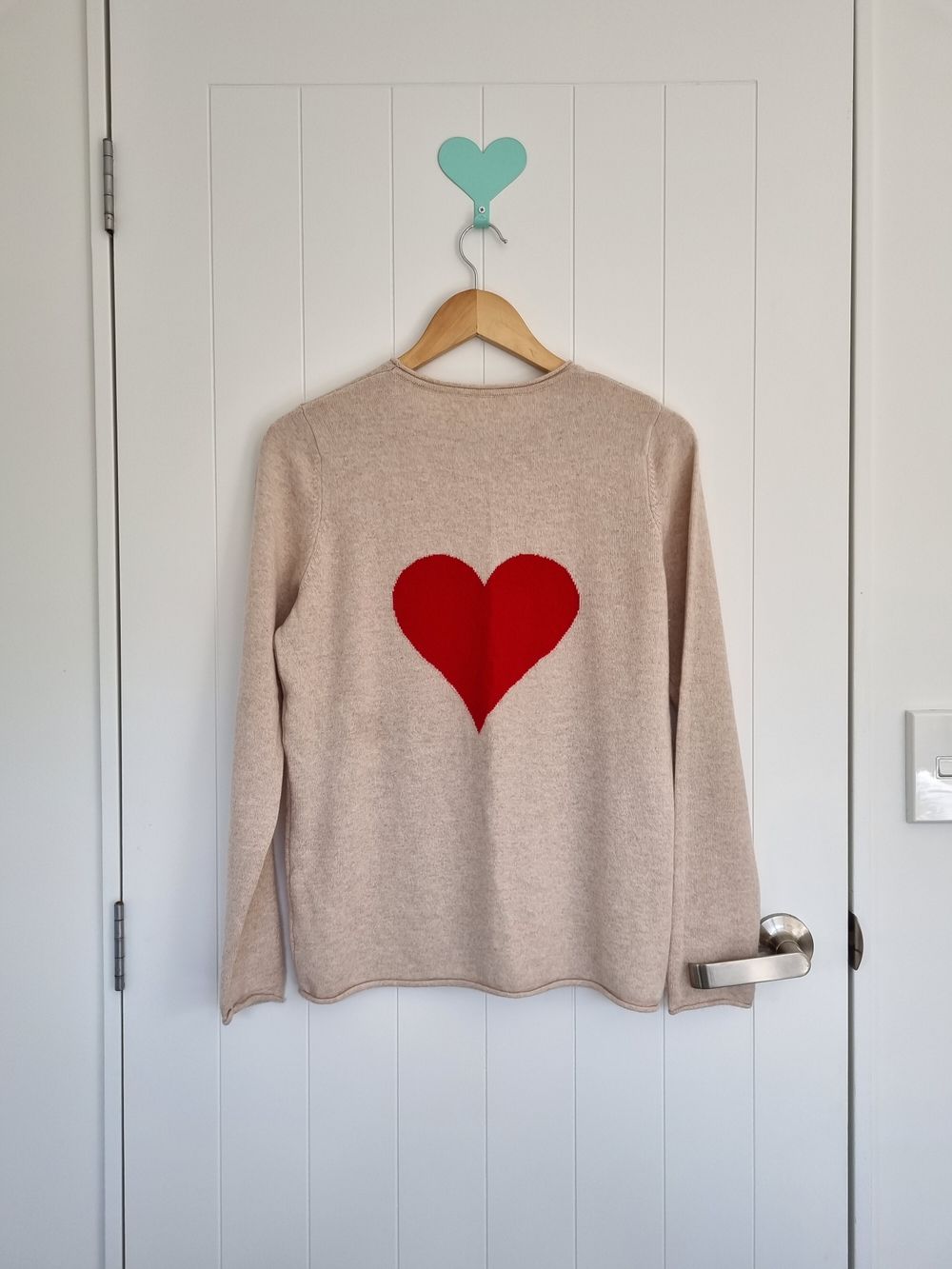 Elle + Riley beige cashmere sweater with red heart
