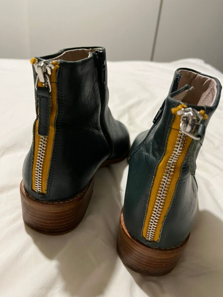 Green Boots, Yellow Zip Accent