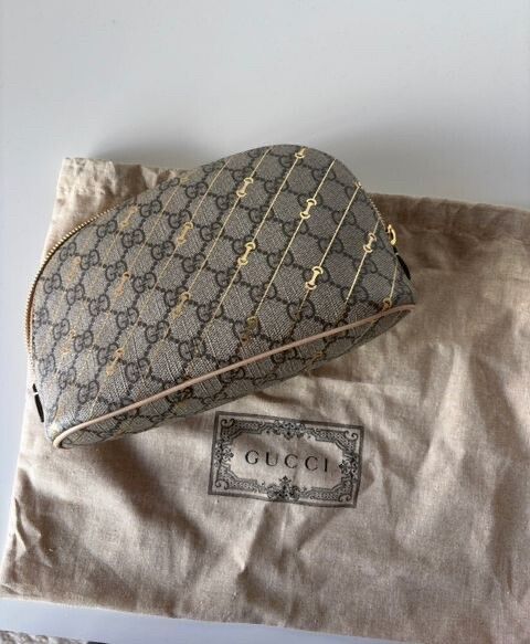 Gucci Cosmetic Pouch - Horsebit gold design