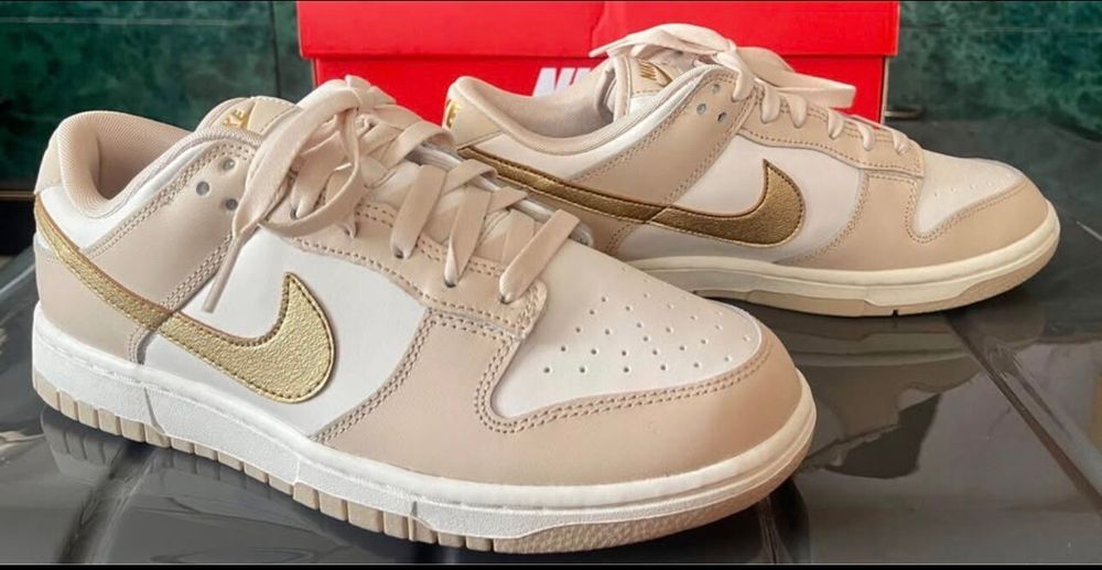 Nike dunk low gold swoosh