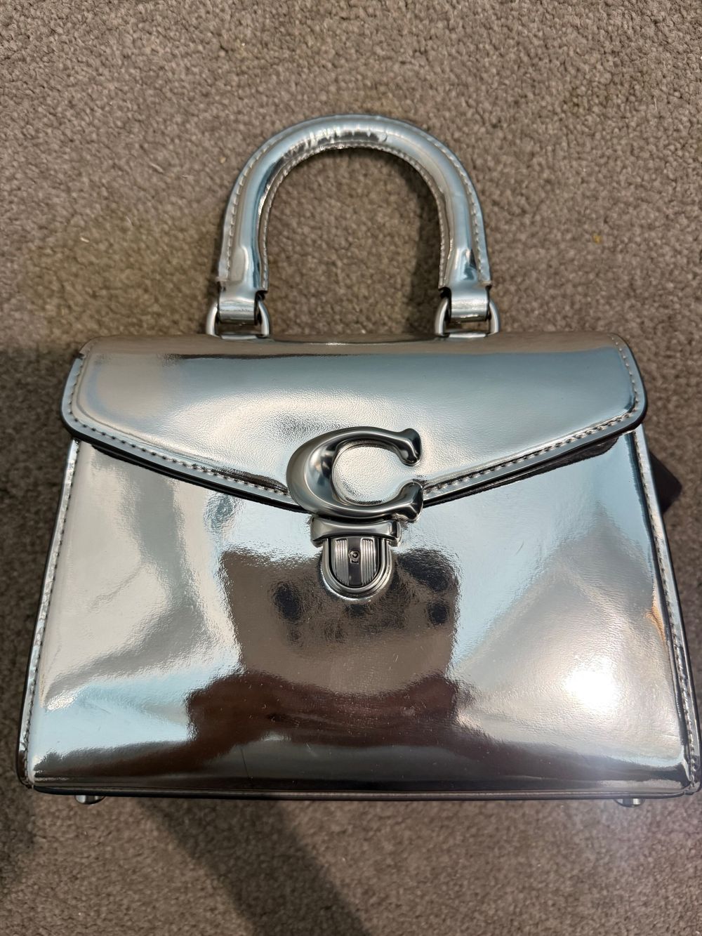 Coach spaceman silver top handle Tabby in small