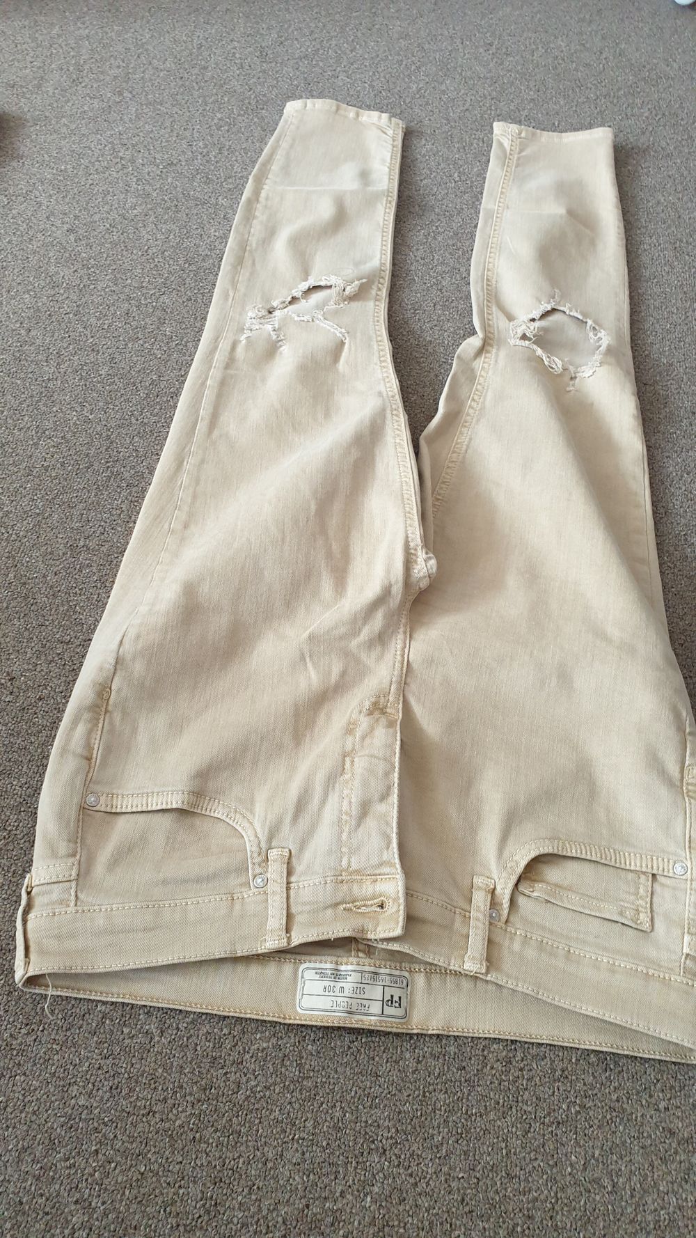 Knee ripped womens jeans