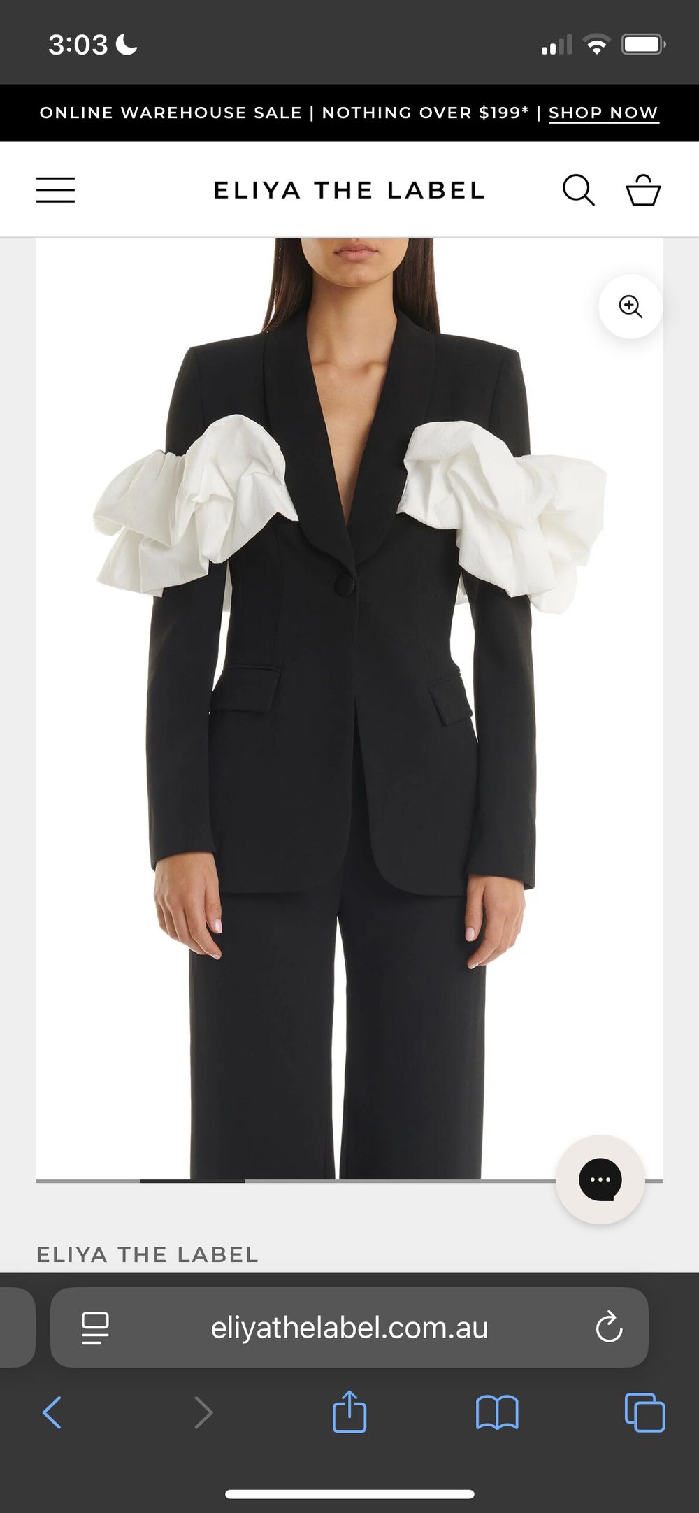 Black blazer with white ruffle