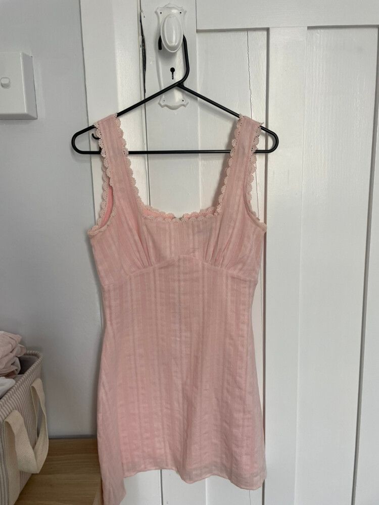 princess polly pink mini dress Straplie skimming mini cut in a leggy length and finished with a floaty frilled hem. Powell Mini Dress | Pink