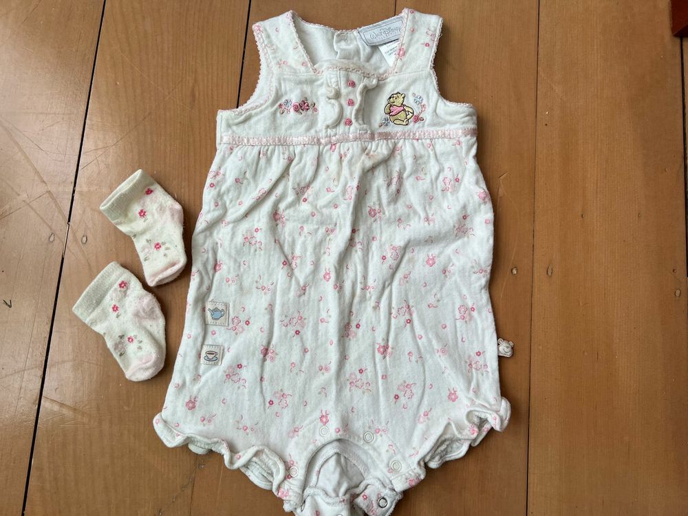 Winnie the Pooh flowered onesie - with matching socks