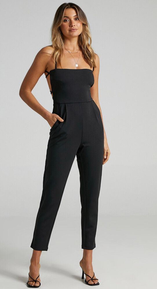 BRINKLEY JUMPSUIT - STRAPPY OPEN BACK JUMPSUIT IN BLACK