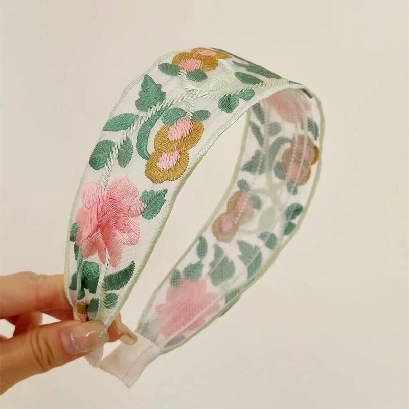 Brand new Floral style headband one size