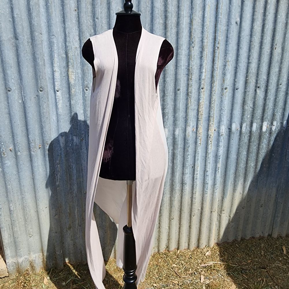 Nude maxi length vest